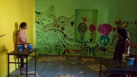 7.1489166762.painting-mural-on-wall-of-school-in-village